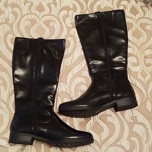 Black boots that go right below the knee
